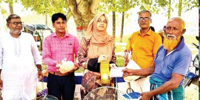 হিলিতে স্বল্প মূল্যে টিসিবি পণ্য বিক্রি